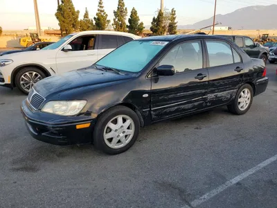 2002 MITSUBISHI LANCER LS, фото 1, лот 10970394