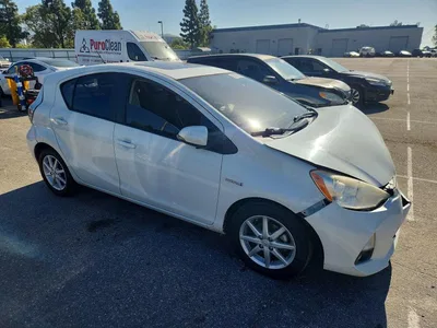 2014 TOYOTA PRIUS C FOUR, фото 4, лот 10557140